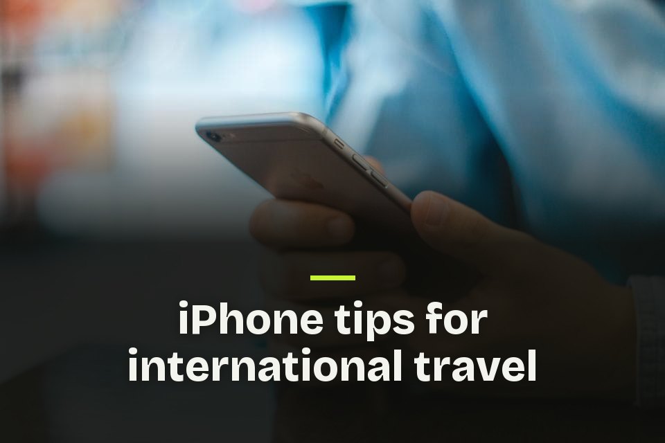 iPhone tips for international travel The words "iPhone tips for international travel" over a photo of a hand holding a smartphone.