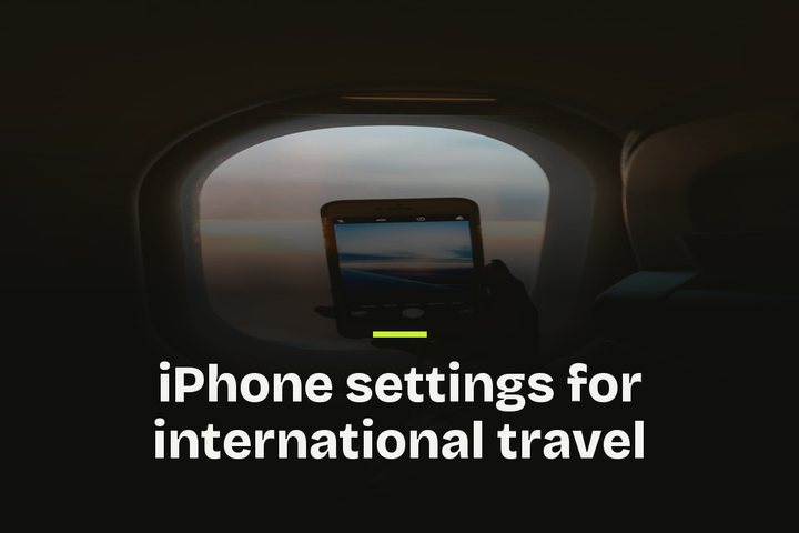 The words "iPhone settings for international travel" over a photo of a phone held up to an airplane window at sunset.