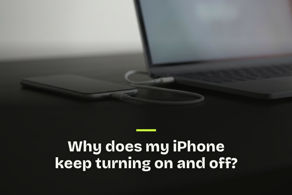 Why does my iPhone keep turning on and off The words "Why does my iPhone keep turning on and off?" over a picture of a phone connected to a laptop by a cable.